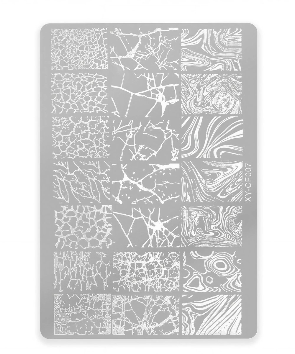 Gray stencil plate showing a grid of white crackle and marbled texture squares