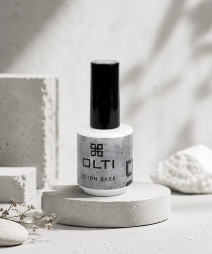 OLTI Beton Base nail polish bottle with a tall black cap on a round concrete pedestal.