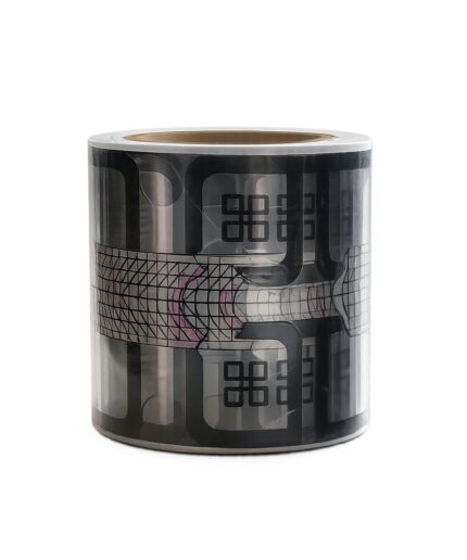 Roll of decorative black-and-gray tape with an abstract grid/digital pattern wrapped around a cylindrical core.